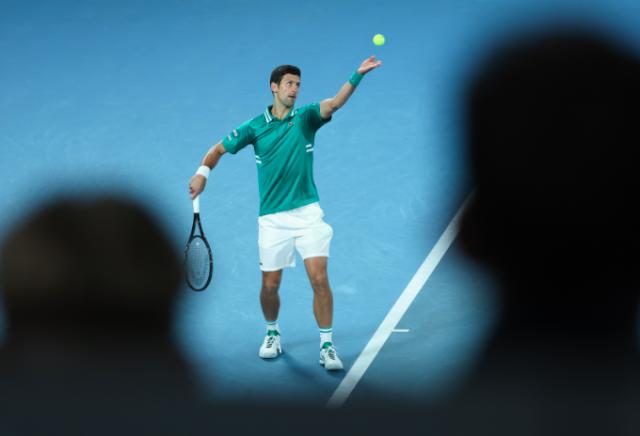 九游官网-德约五盘鏖战击退弗里茨 意外受伤卫冕之旅蒙阴影